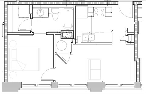 A floor plan of a house with a kitchen, living room, and bathroom.