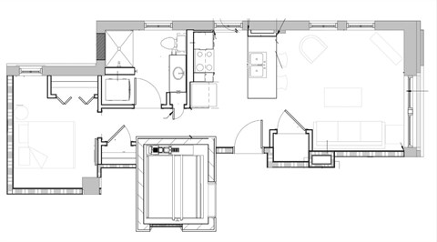 A floor plan of a house with a kitchen, living room, and bathroom.