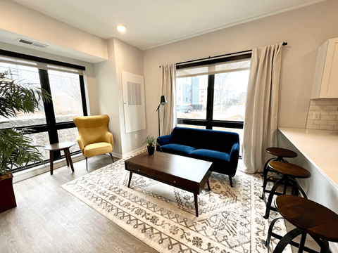 a living room with a couch and a coffee table
