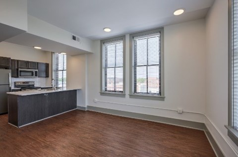 A kitchen with a microwave and a countertop.