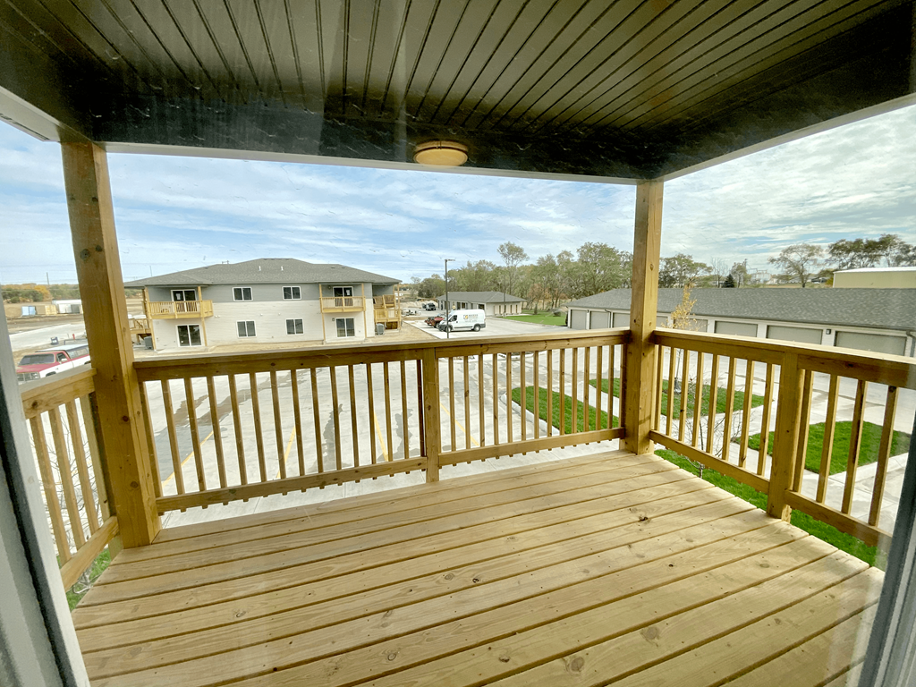 a view of the deck from the porch of a house