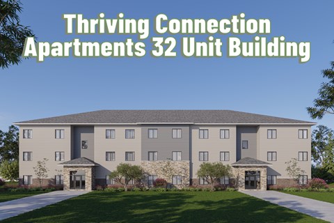 A large building with the words "Thriving Connection Apartments 32 Unit Building" written above it.