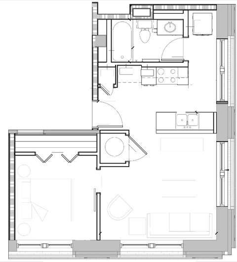 A floor plan of a house with a kitchen, living room, and bathroom.