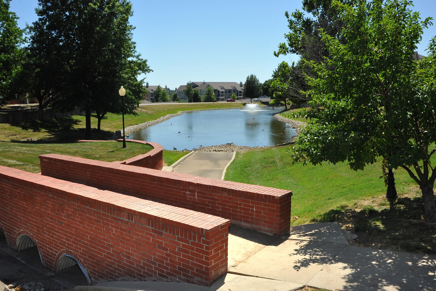 View of the lower lake at The Lakes Apartments.