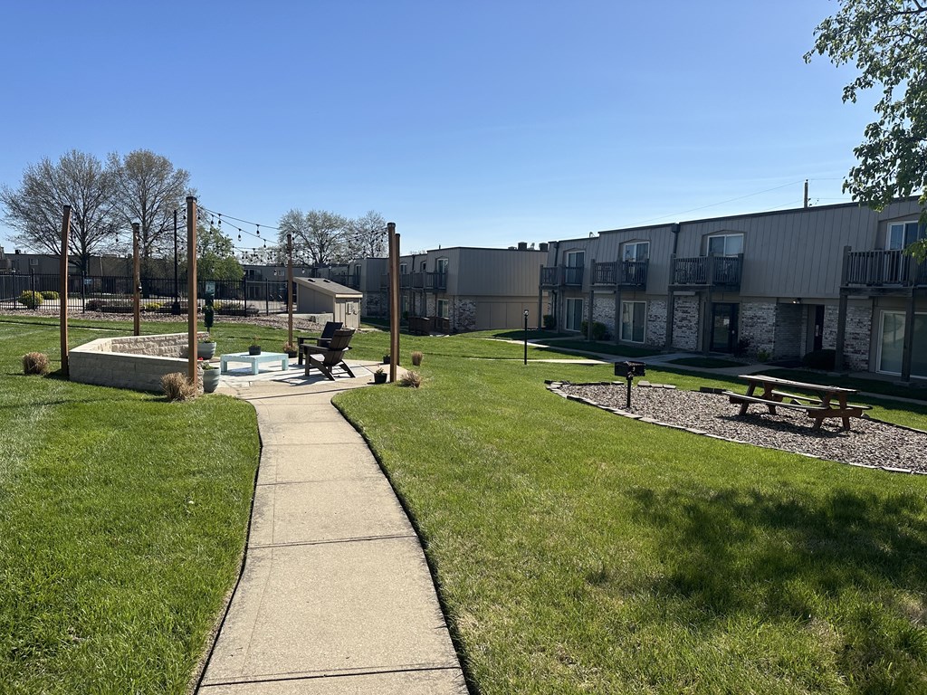 Lush landscaping at Park 25 Apartments, featuring vibrant greenery and well-maintained grounds.