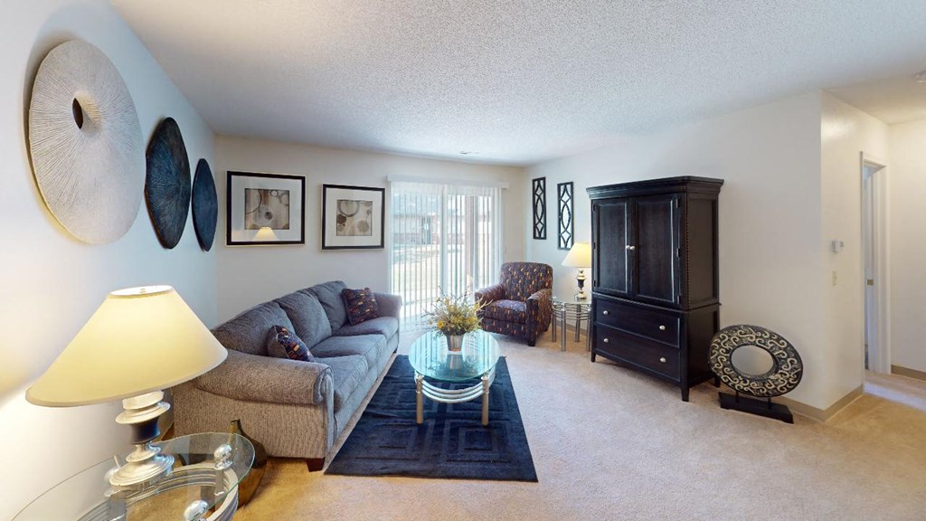 a living room with a couch and a coffee table