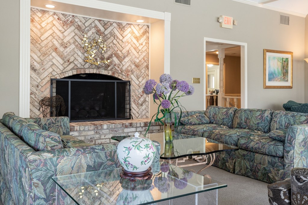 A bright and open seating area inside the clubhouse at Regent’s Walk Apartment Homes.