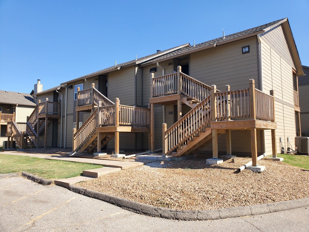 Willow Creek Apartments Complex Willow Creek Apartments Complex - Exterior view of the apartment buildings with landscaping.
