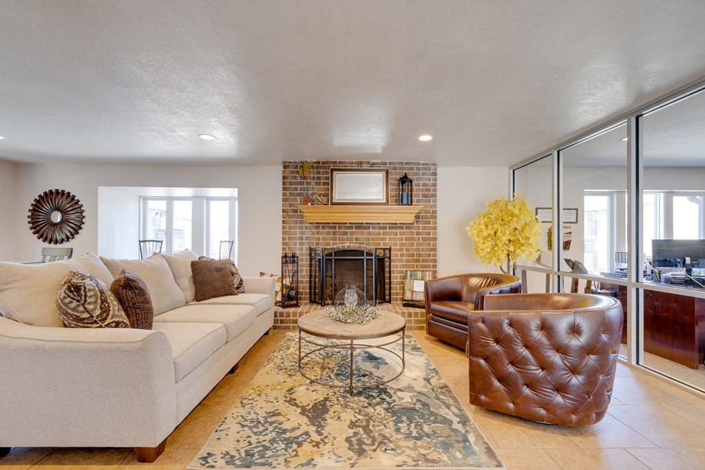 A classic living room in the clubhouse interior, featuring timeless furniture, comfortable seating arrangements, and tasteful decor, provides a welcoming and cozy communal space for residents to relax and socialize.