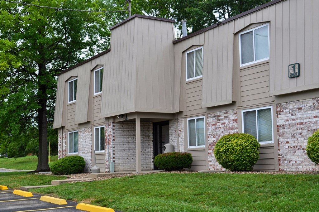 Exterior view of the Park 25 Apartments building, highlighting its architecture and surrounding landscaping.