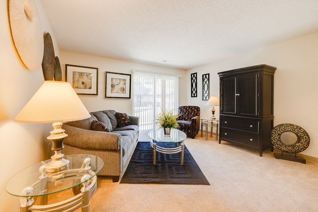 a living room with a couch and a table