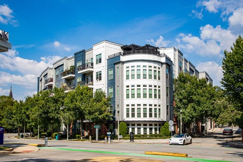 a building on the corner of a city street