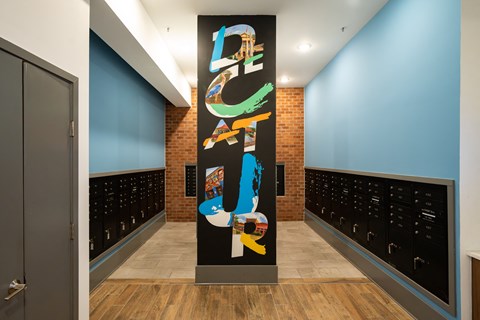 a mural on a wall in a room filled with wine bottles