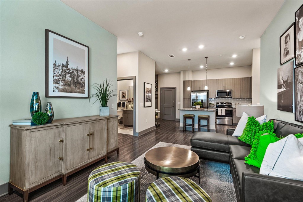 a living room with a couch and a chair