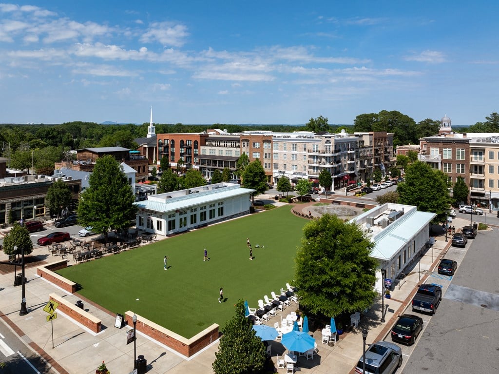an aerial view of a park and buildings in a city