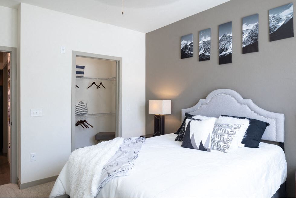 Centro Apartments model bedroom and open closet