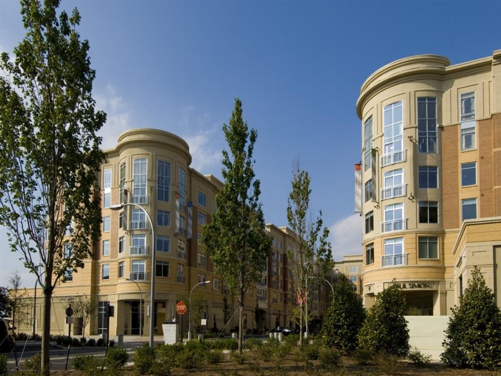 an image of the exterior of an apartment building