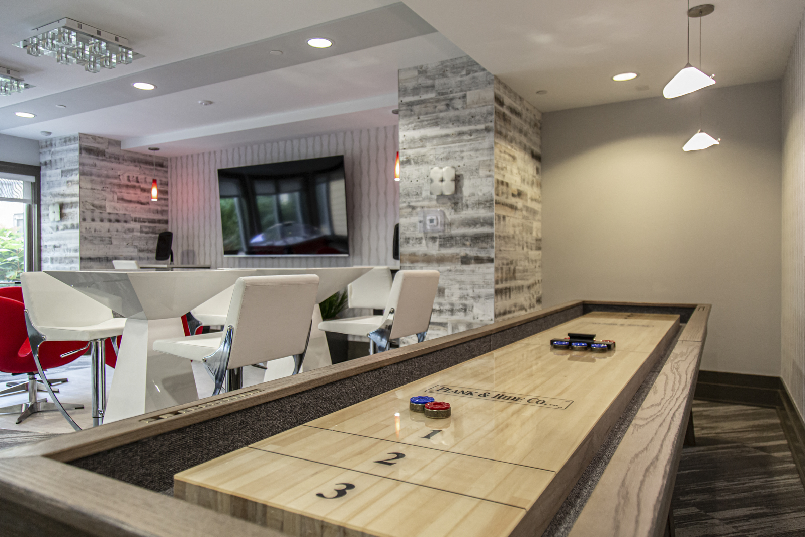 NoBe Market Apartments shuffleboard and lounge