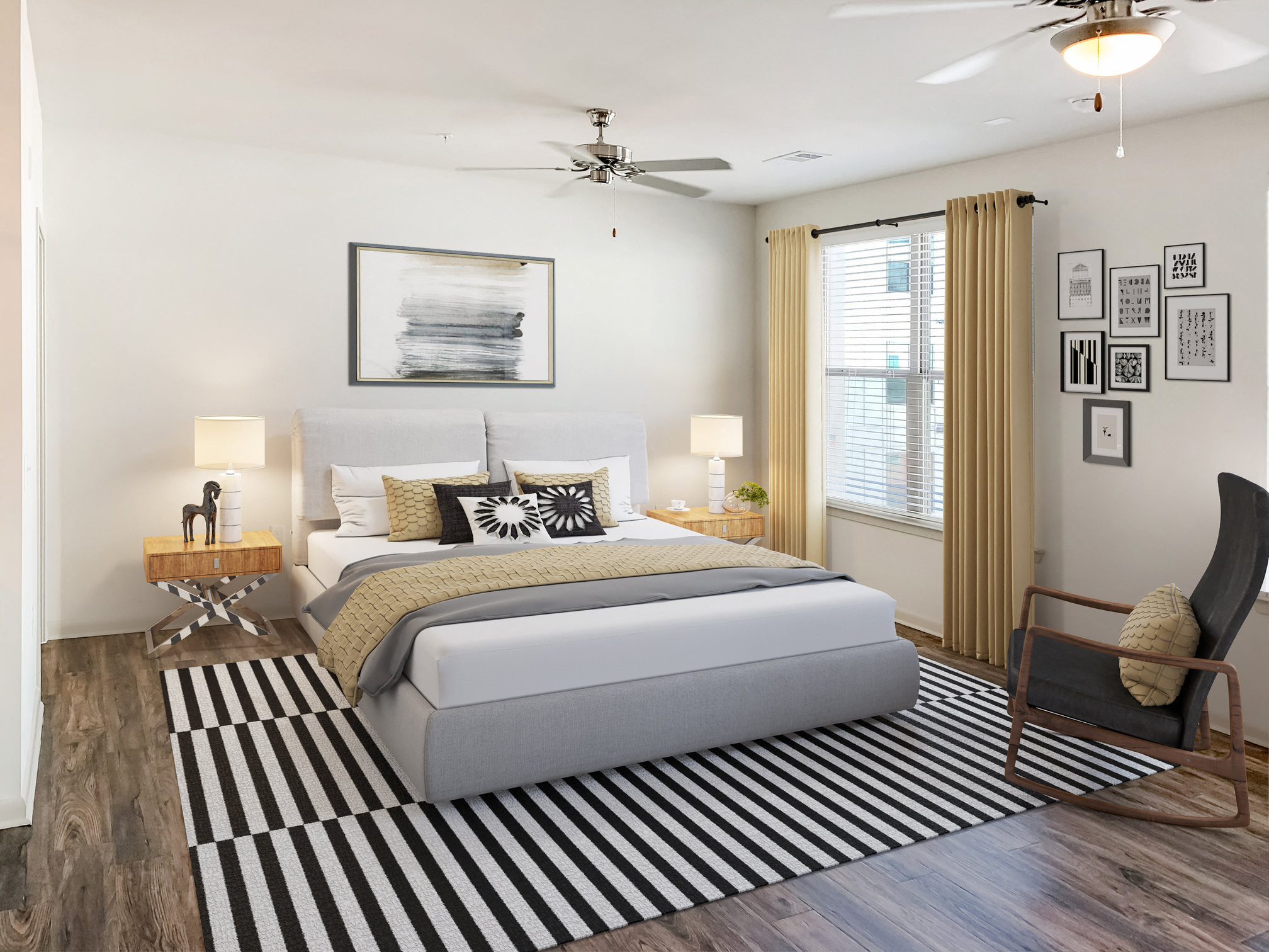 a bedroom with a bed and a ceiling fan