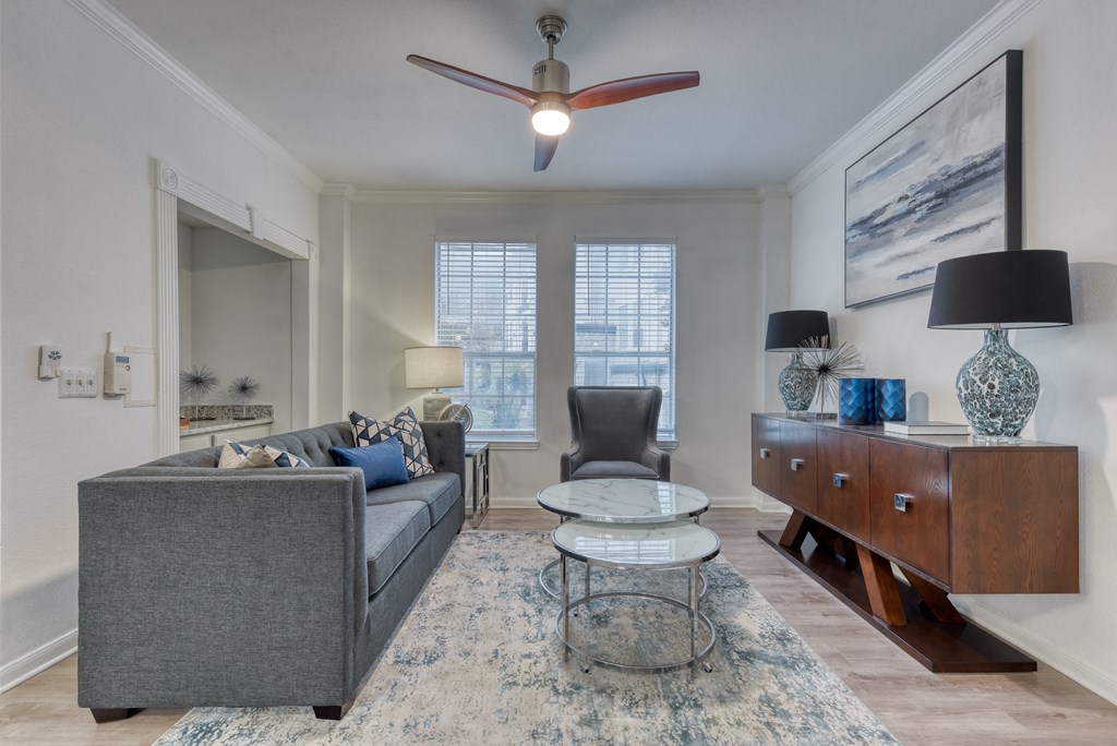 a living room with a couch and a chair