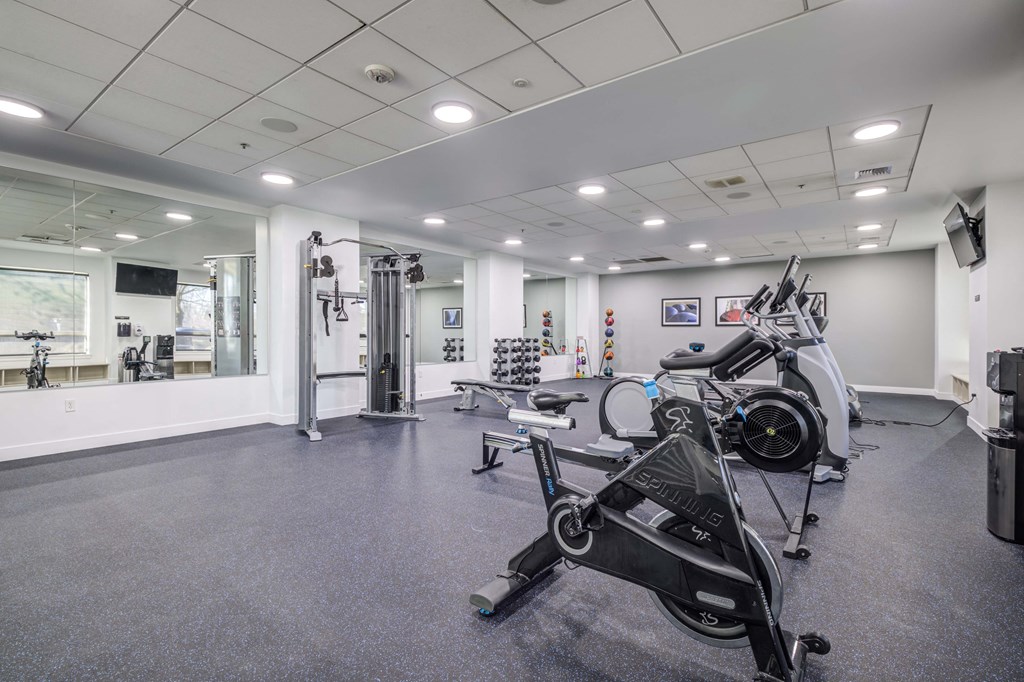 the gym at the district flats apartments in lenexa