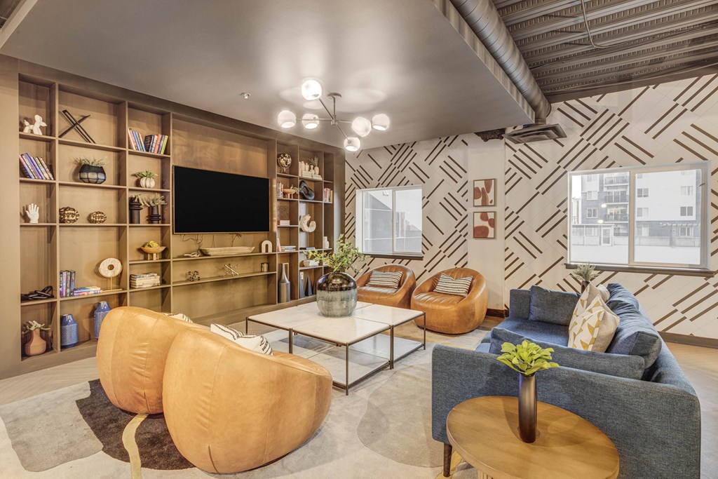 a living room with a couch and a tv