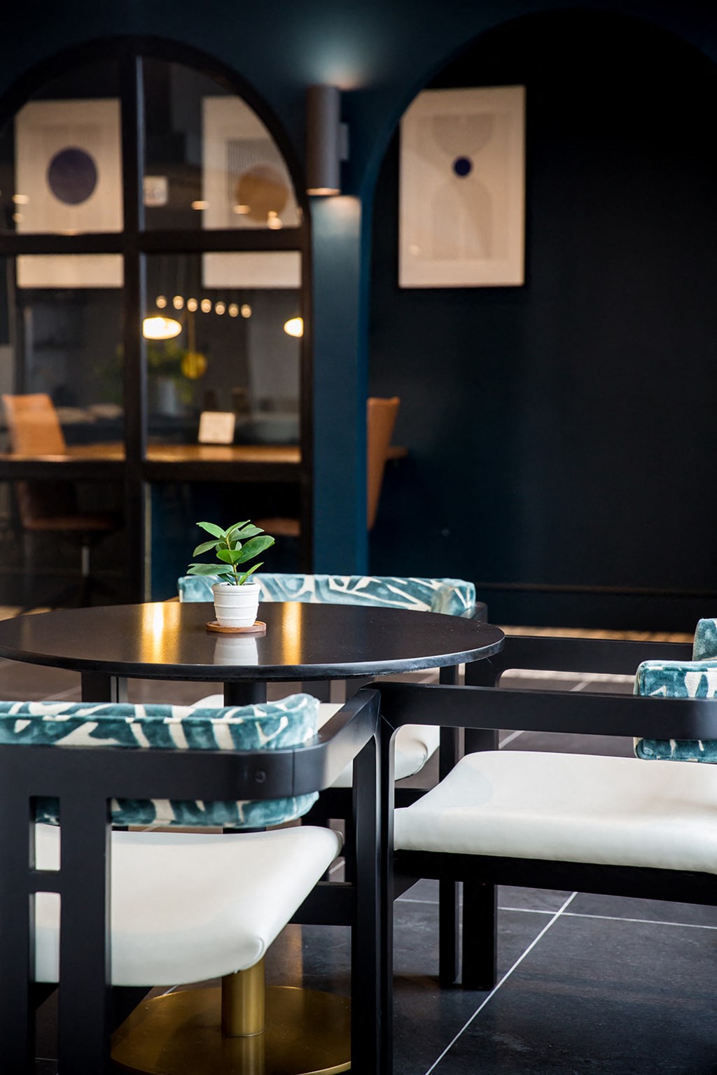 a table and chairs in a restaurant