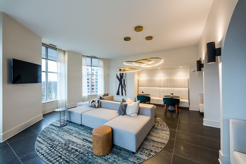 a living room with a couch and a table