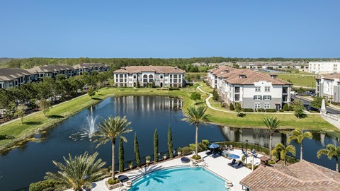 an aerial view of the resort style pool and community