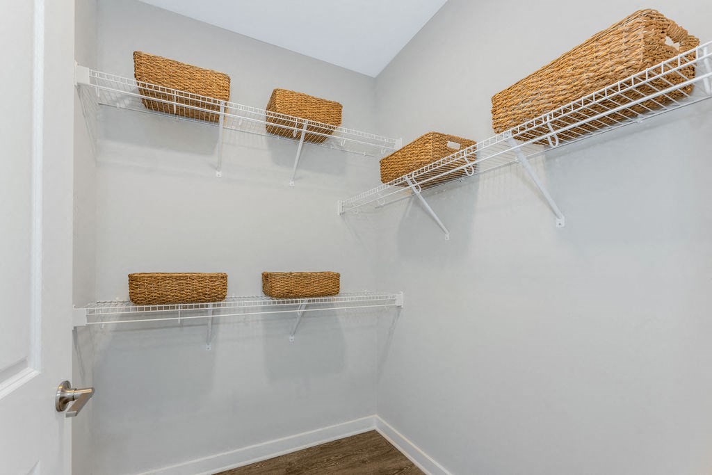 a walk in closet in a 555 waverly unit