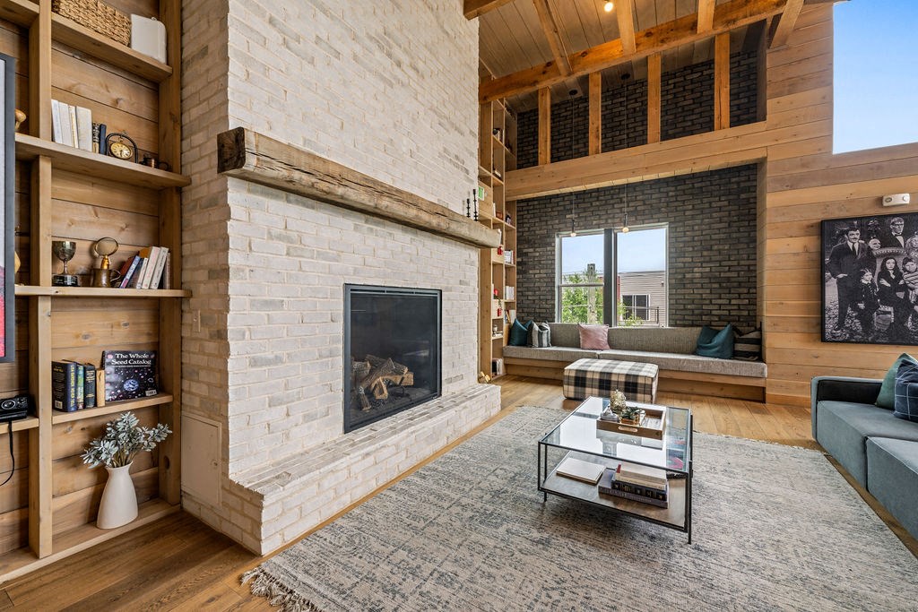 A living room with a fireplace and a couch.