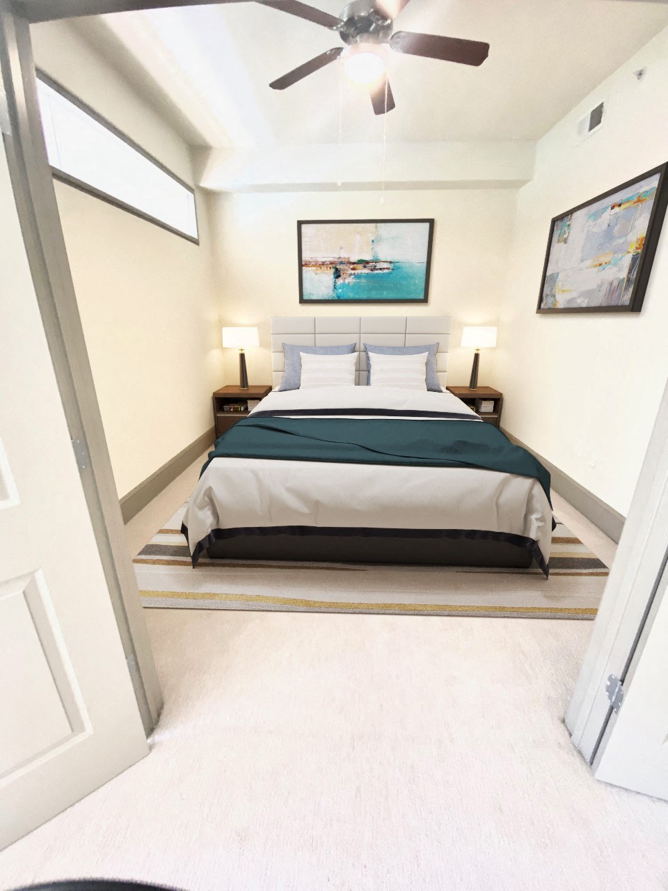 a bedroom with a bed and two nightstands