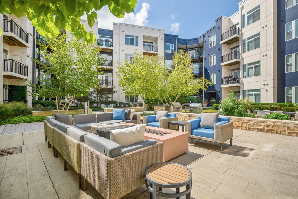 an outdoor patio with couches and tables at Indigo 301 Apartments, Pennsylvania, 19406