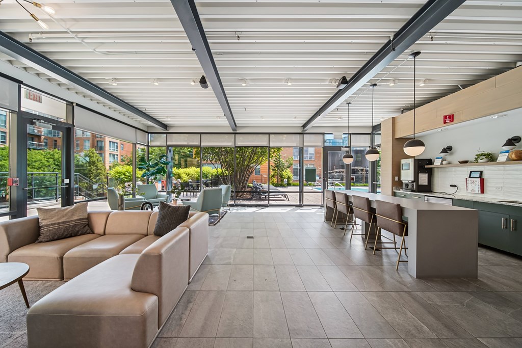 A modern outdoor seating area with a view of the city.