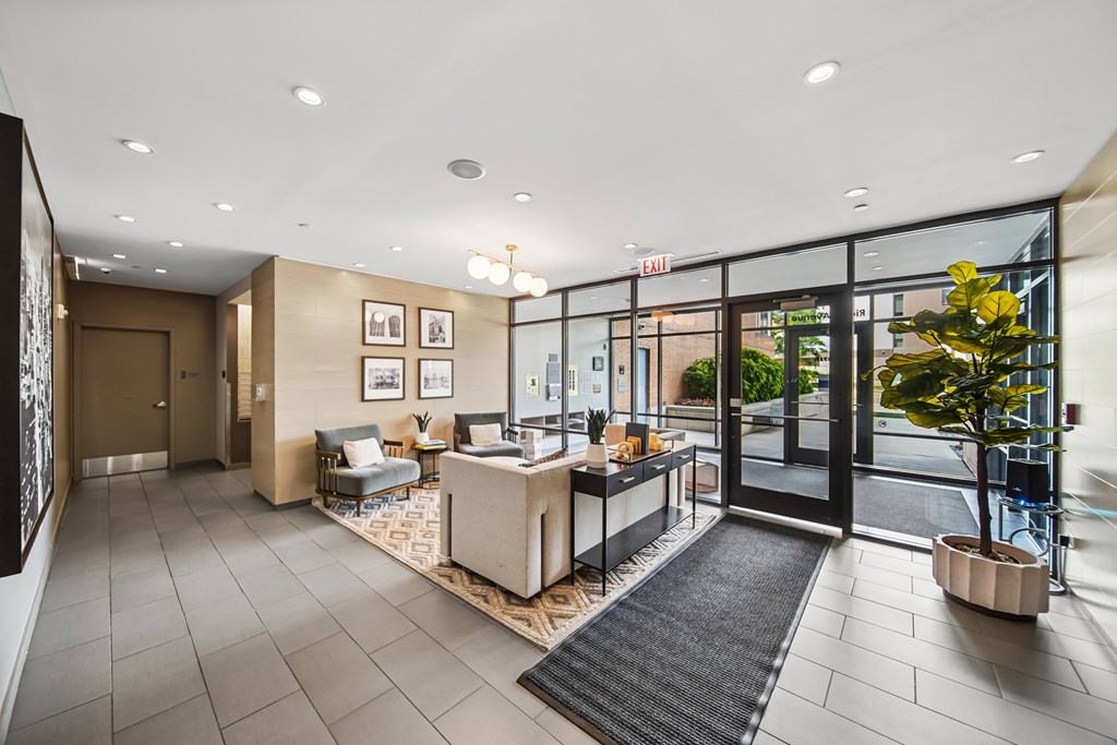 A reception area with a desk and chairs.