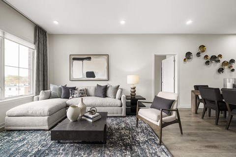 a living room with a couch and a table