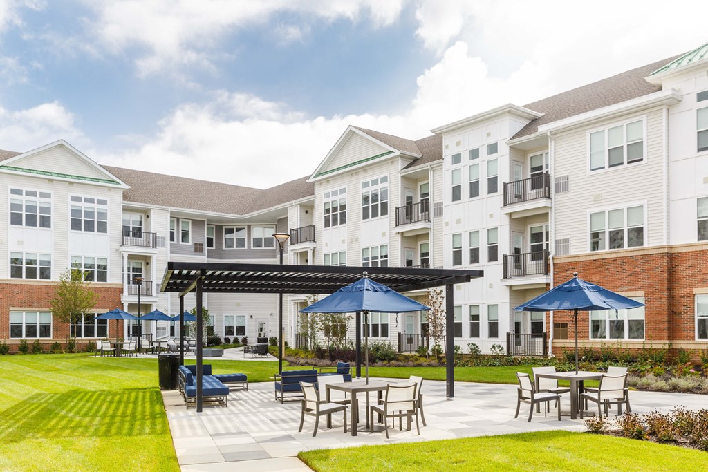 Building exterior with sitting area at 99 Bridge, New Jersey