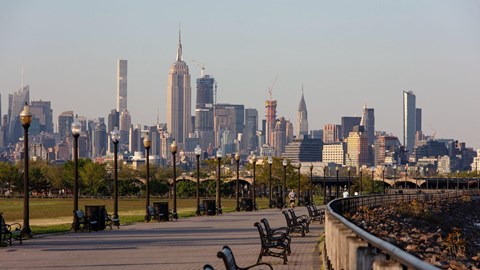 a view of the city skyline from a park with benches at One Ten Apartments, Jersey City , NJ, 07310