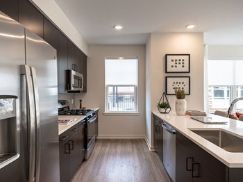 Fully Equipped Kitchen Includes Frost-Free Refrigerator, Electric Range, & Dishwasher Fully Equipped Kitchen Includes Frost-Free Refrigerator, Electric Range, & Dishwasher at The Grove at Piscataway, Piscataway, New Jersey - Photo Gallery 4