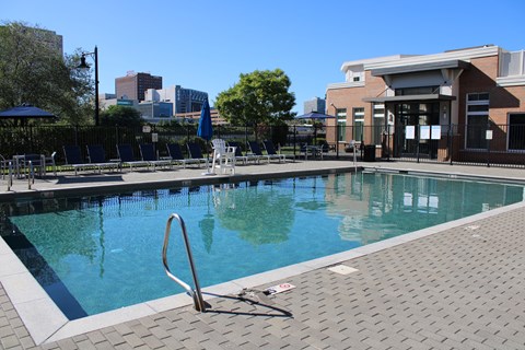 A pool with a ladder in the middle of it.