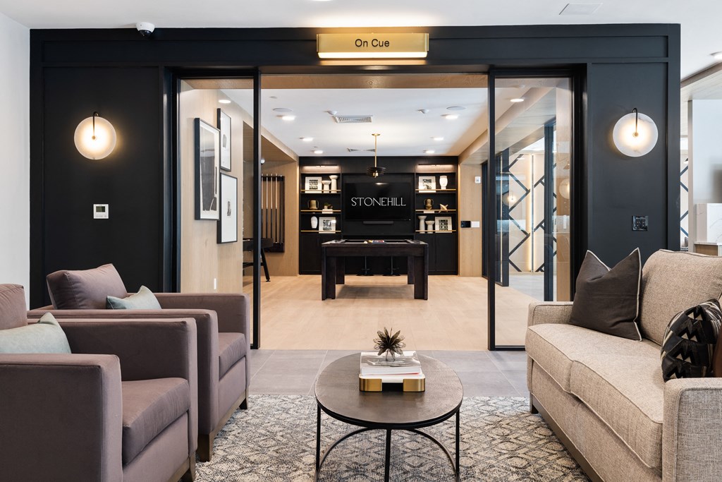 a living room with couches and a table