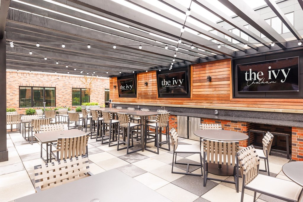the interior of the ivy restaurant with tables and chairs at The Ivy, Chatham, 07928
