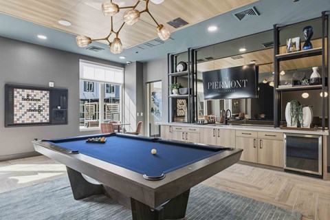 A lounge with a billards table