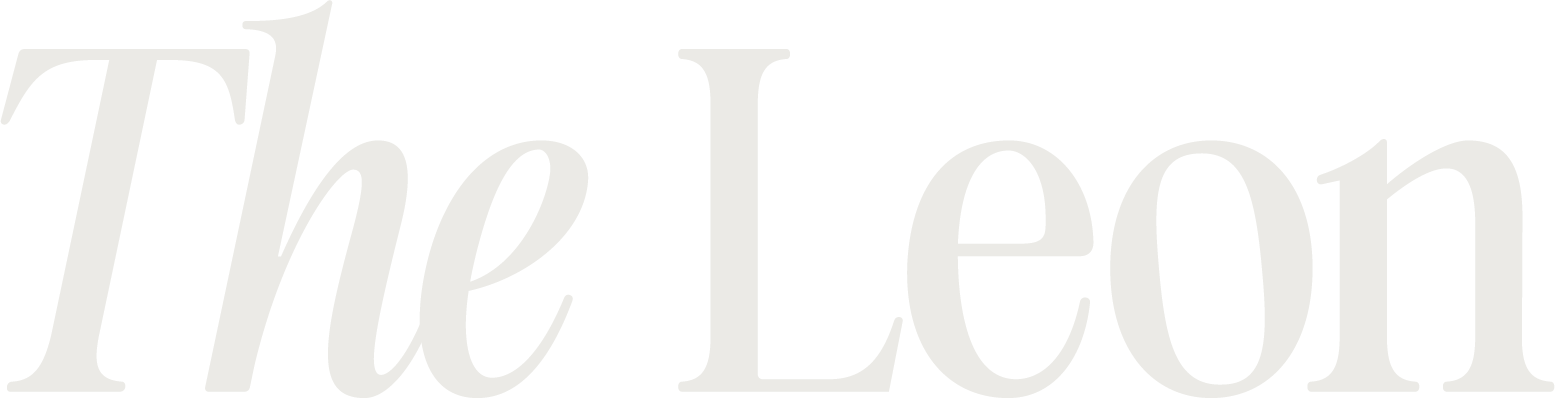 Property entrance sign with bold white lettering at The Leon Apartments, Millburn, NJ 07041