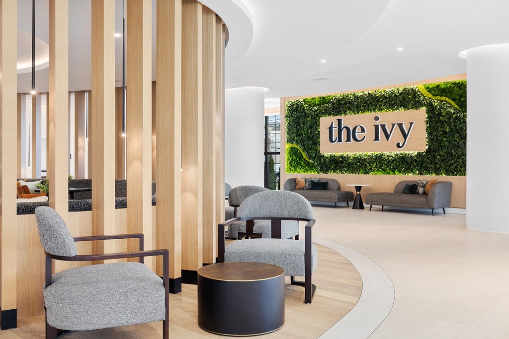 the ivy lobby with chairs and a sign on the wall at The Ivy, New Jersey, 07928