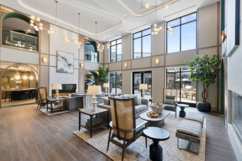 A modern living room with a large sofa set and a coffee table.