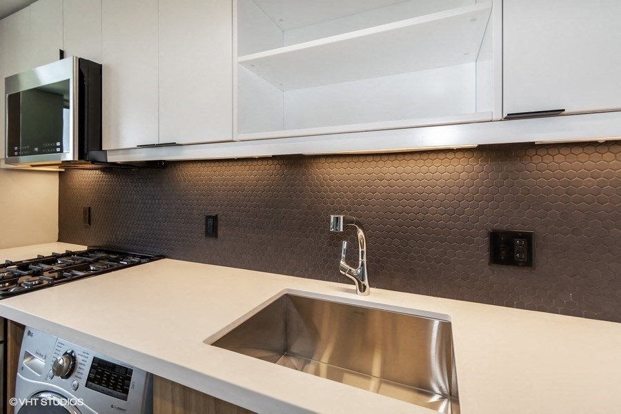 Sink With Faucet at Carver and Slowe Apartments, Washington, 20001