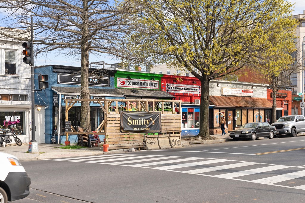 A street view with a Smitty's storefront in the foreground.