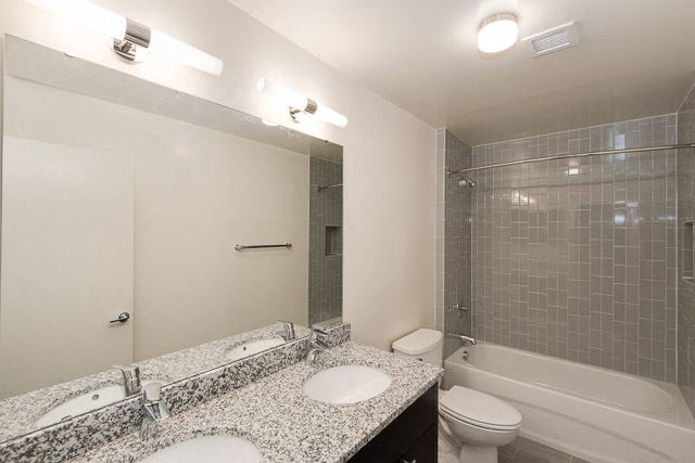 a bathroom with a sink toilet and bathtub a bathroom with a sink toilet and bathtub - Photo Gallery