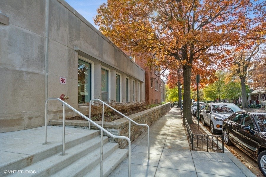 a city building with a tree in front of it at Carver and Slowe Apartments, Washington